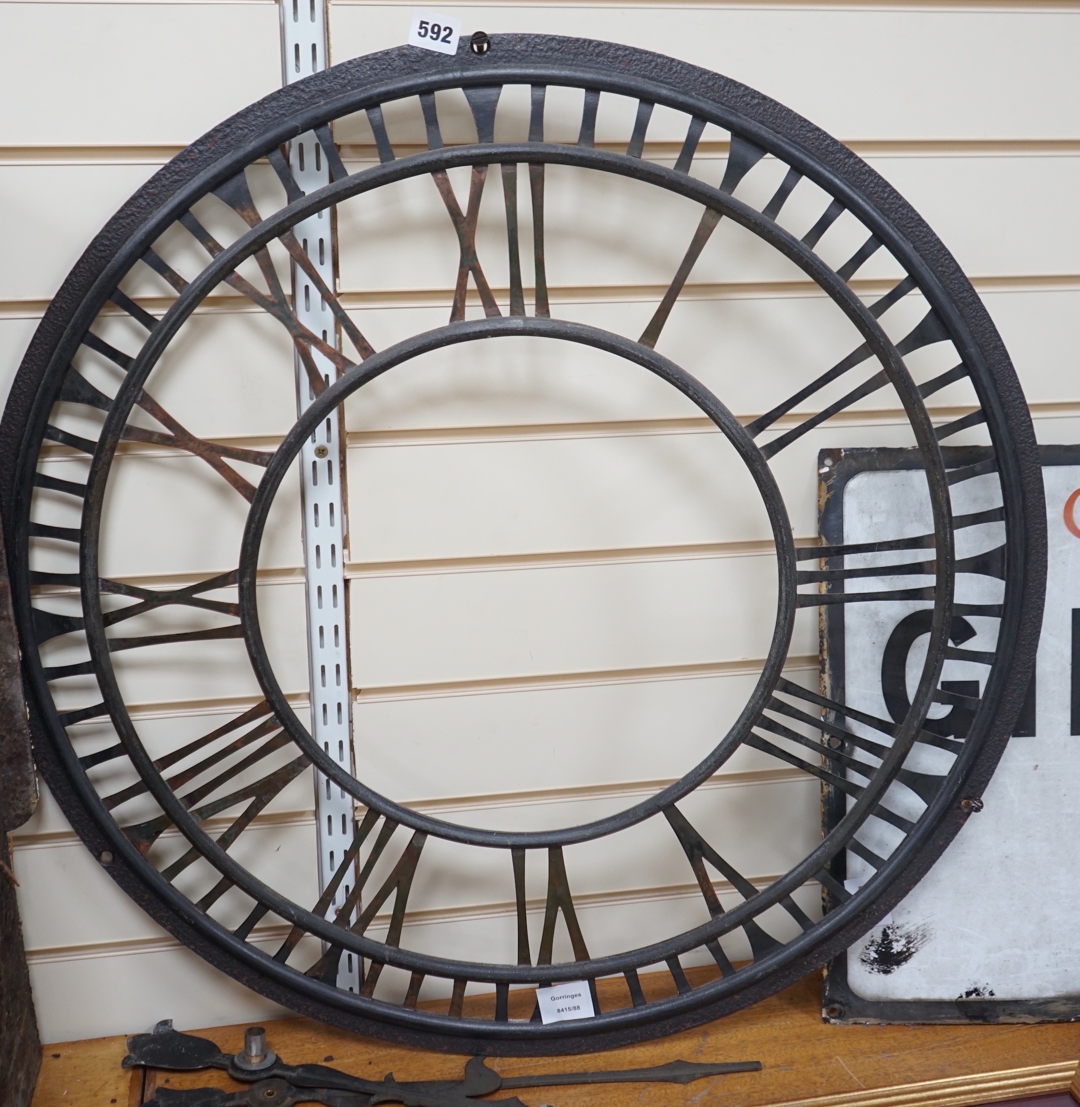 A painted copper wall clock chapter ring and hands, 74cm diameter